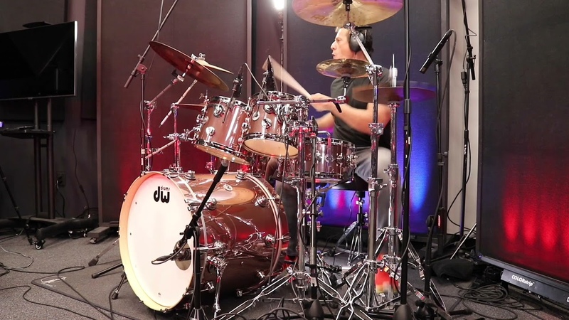 TL playing on a DW Pink Copper Custom Shop