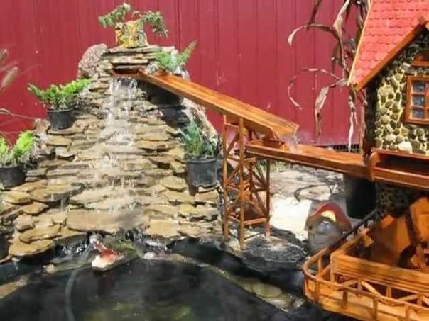 Water mill and alpine hill. Водяная мельница и альпийская горка